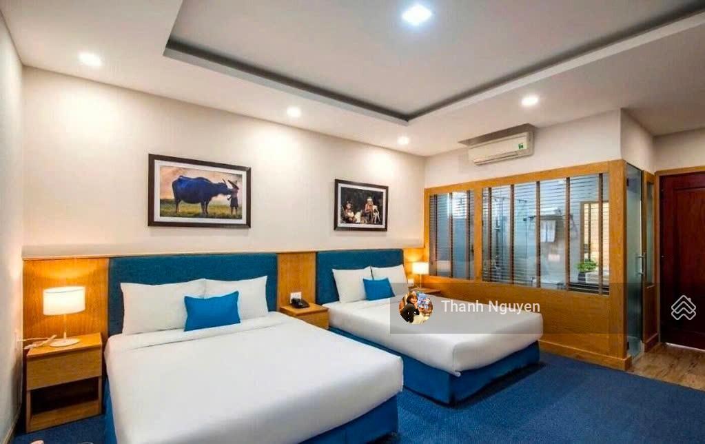 Ngay cửa ngõ sân bay! tòa nhà khách sạn mt trường sơn  15x25m  hầm 7 tầng  hđ 400 tr  150 tỷ