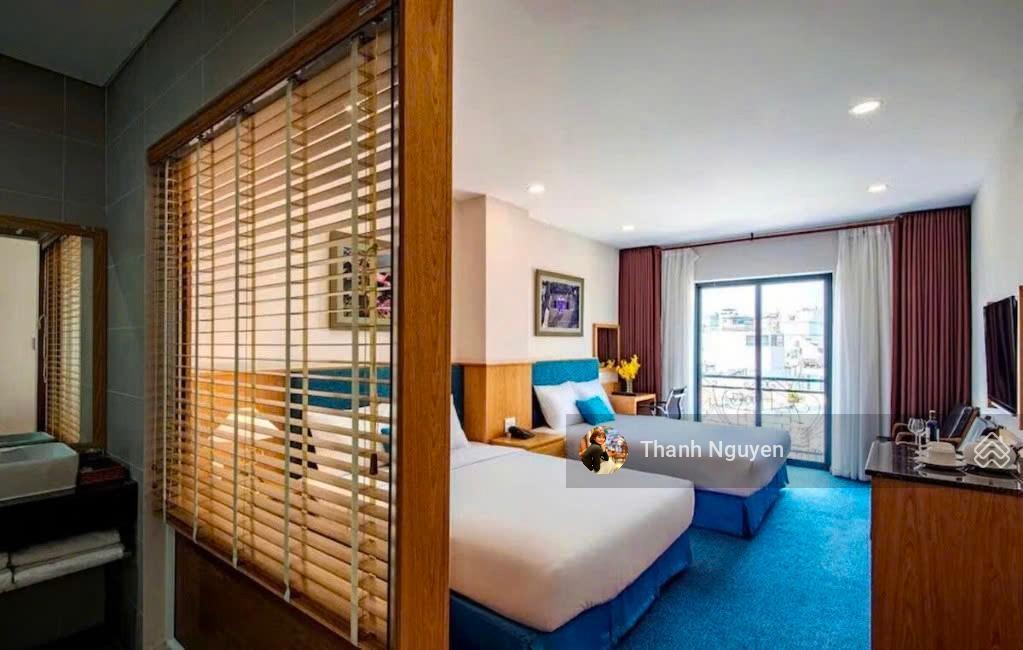 Ngay cửa ngõ sân bay! tòa nhà khách sạn mt trường sơn  15x25m  hầm 7 tầng  hđ 400 tr  150 tỷ