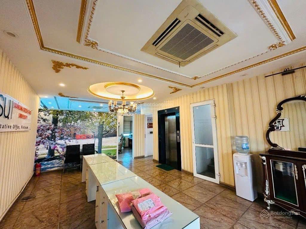 Mặt phố đống đa  tòa nhà 9 tầng thang máy  2 mặt thoáng  mặt tiền quyền lực 8m  sổ vuông đét