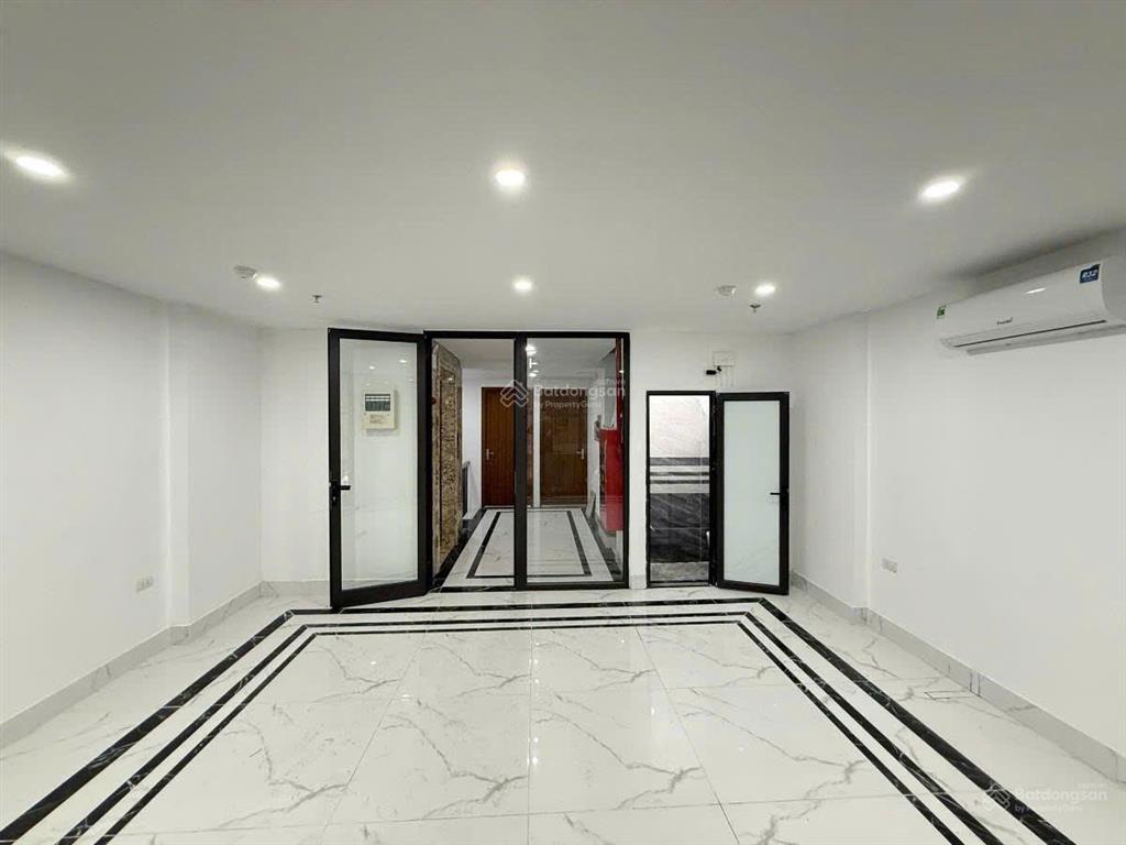 Phố chùa láng  tòa nhà 10 tầng  2 mặt thoáng  mặt tiền 5,5m  sổ đẹp.