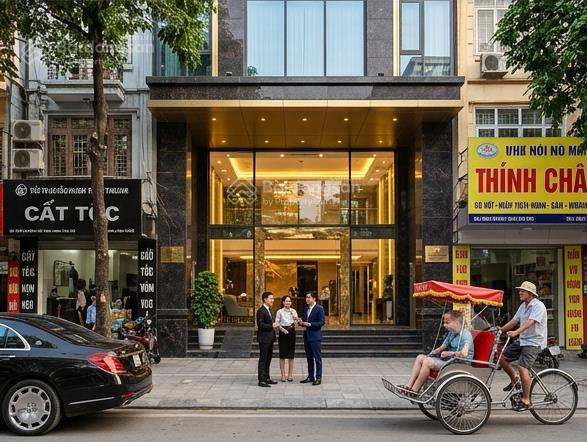Mặt phố vương thừa vũ  tòa nhà 9 tầng thang máy  dòng tiền hấp dẫn  sổ vuông nở hậu.