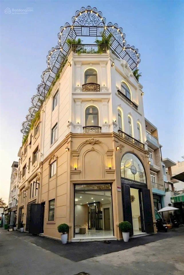 Bán nhà mới như hình góc 2mt đường quang trung, gò vấp. 7x7m, 5tầng có t.máy, hxh 5m, giá 7.7tỷ