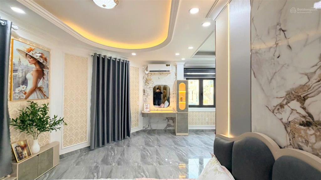 Bán nhà mới như hình góc 2mt đường quang trung, gò vấp. 7x7m, 5tầng có t.máy, hxh 5m, giá 7.7tỷ