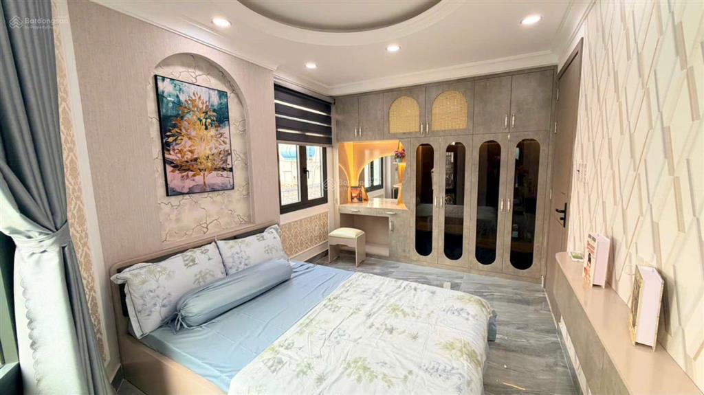 Bán nhà mới như hình góc 2mt đường quang trung, gò vấp. 7x7m, 5tầng có t.máy, hxh 5m, giá 7.7tỷ