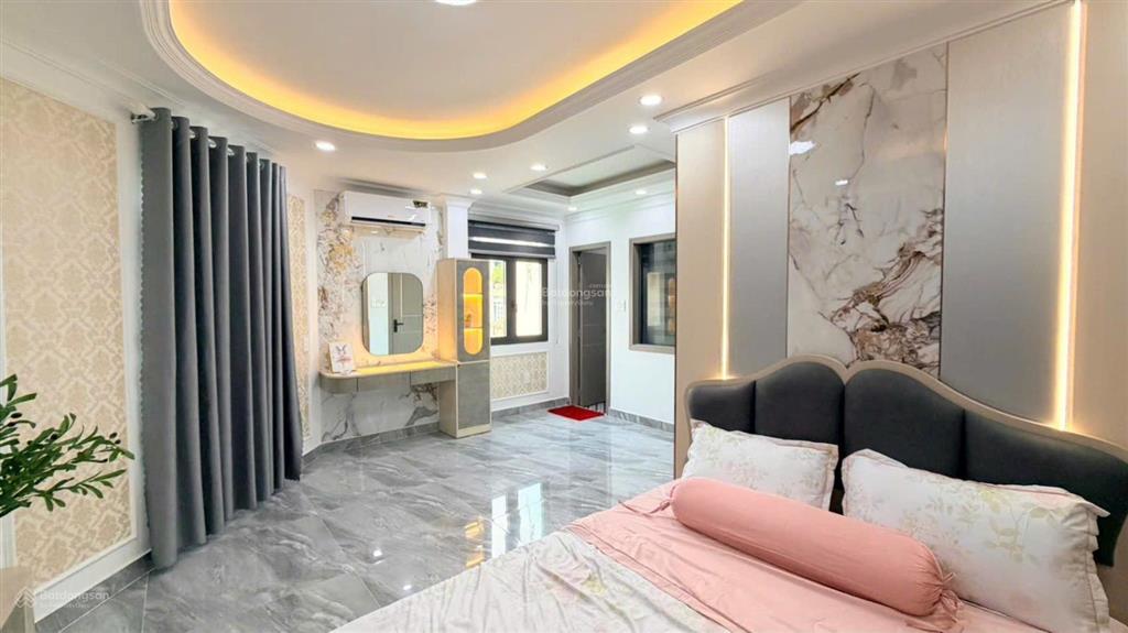 Bán nhà mới như hình góc 2mt đường quang trung, gò vấp. 7x7m, 5tầng có t.máy, hxh 5m, giá 7.7tỷ