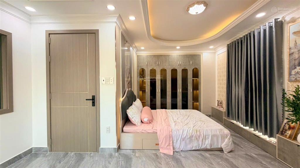 Bán nhà mới như hình góc 2mt đường quang trung, gò vấp. 7x7m, 5tầng có t.máy, hxh 5m, giá 7.7tỷ