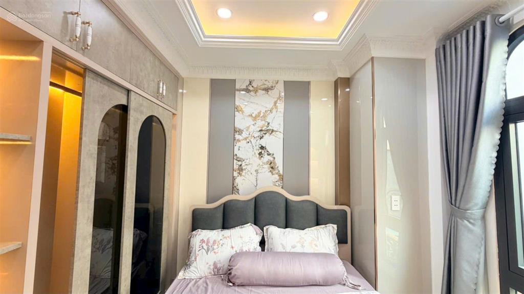 Bán nhà mới như hình góc 2mt đường quang trung, gò vấp. 7x7m, 5tầng có t.máy, hxh 5m, giá 7.7tỷ