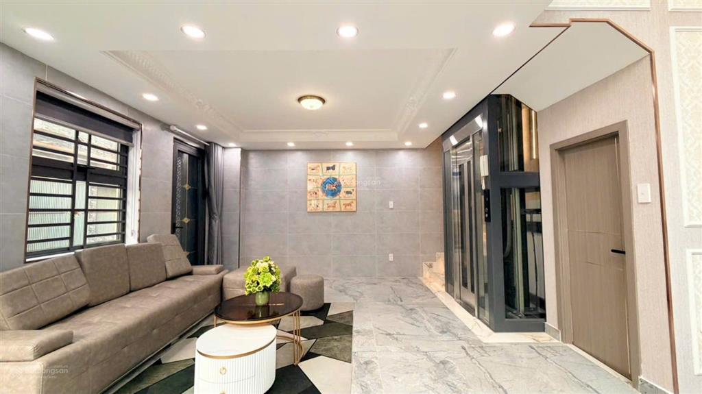 Bán nhà mới như hình góc 2mt đường quang trung, gò vấp. 7x7m, 5tầng có t.máy, hxh 5m, giá 7.7tỷ