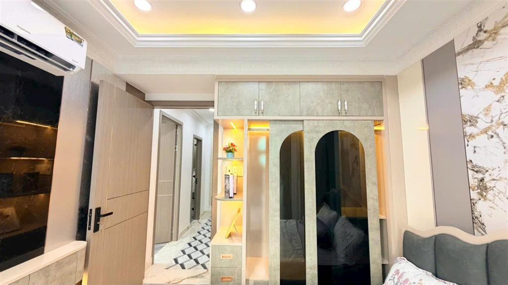 Bán nhà mới như hình góc 2mt đường quang trung, gò vấp. 7x7m, 5tầng có t.máy, hxh 5m, giá 7.7tỷ