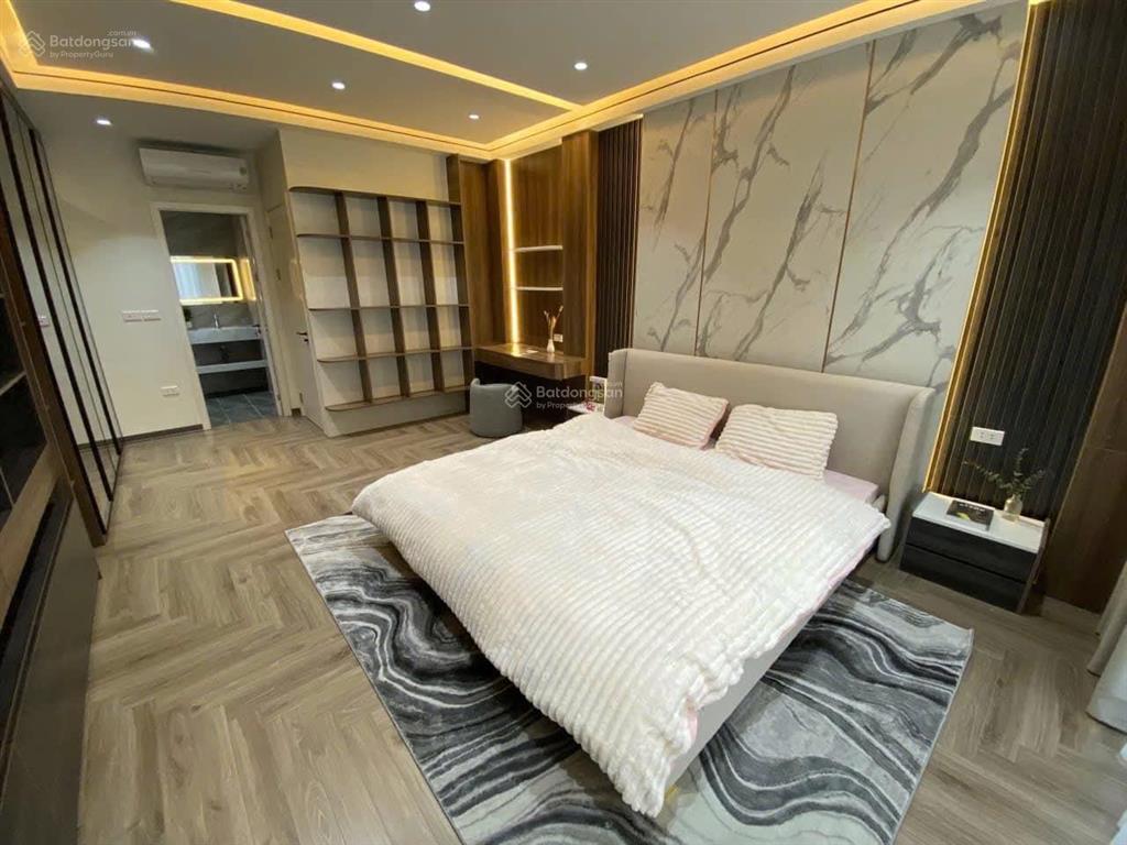 Cổ linh thạch bàn  6 tầng thang máy sổ 55m  ô tô vào nhà chỉ hơn 9 tỷ.