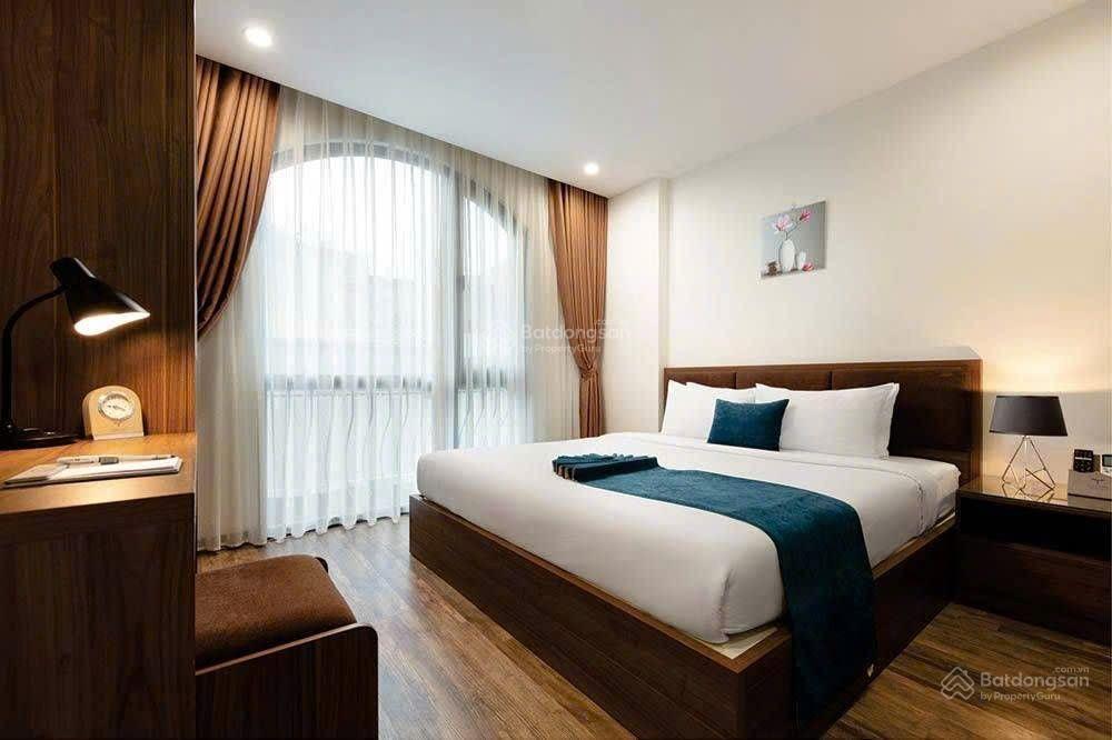 Bán nhà lạc long quân 323m2, 9 tầng 1 hầm giá 154 tỷ. tây hồ