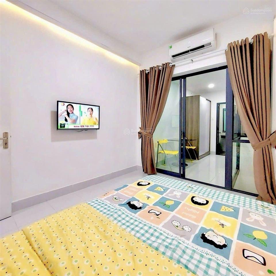 Sát cạnh hẻm xe hơi, ngay bùi văn ba, q7, 4 tầng, (7,2x14,2m), 11pn, dòng tiền 40tr/tháng