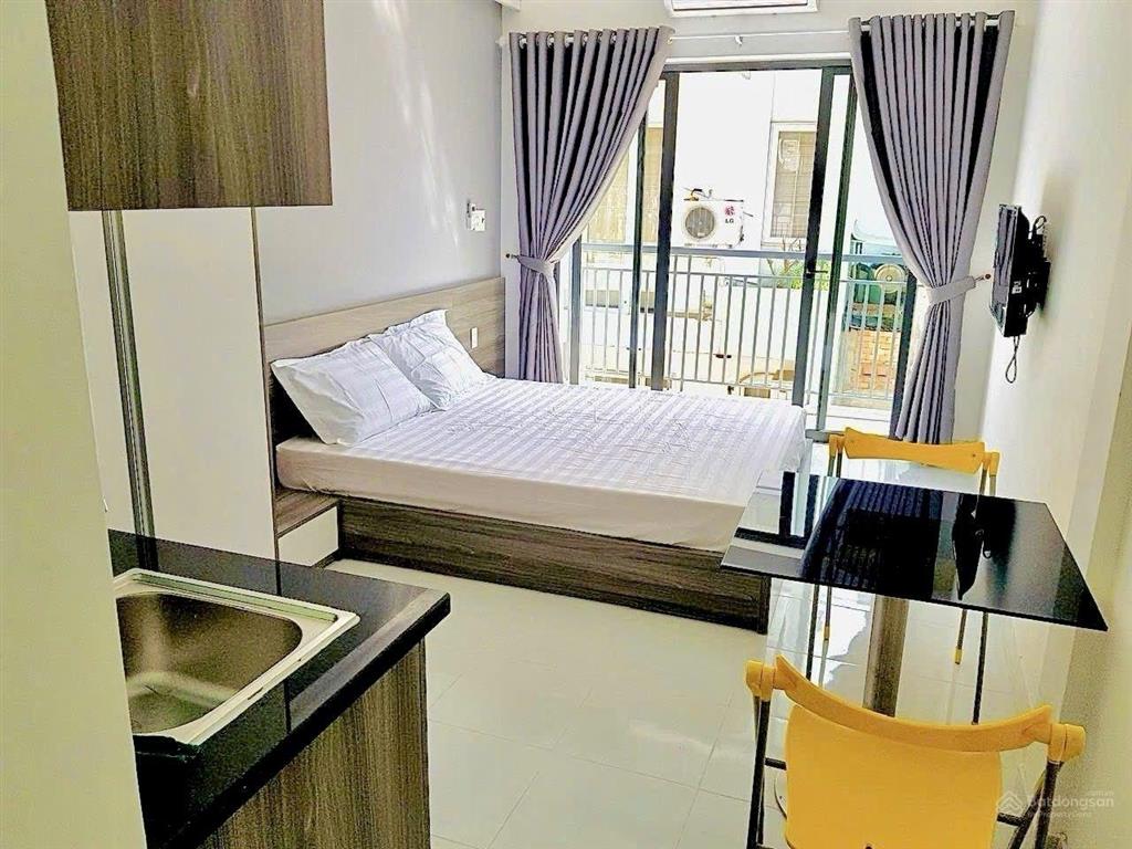 Sát cạnh hẻm xe hơi, ngay bùi văn ba, q7, 4 tầng, (7,2x14,2m), 11pn, dòng tiền 40tr/tháng