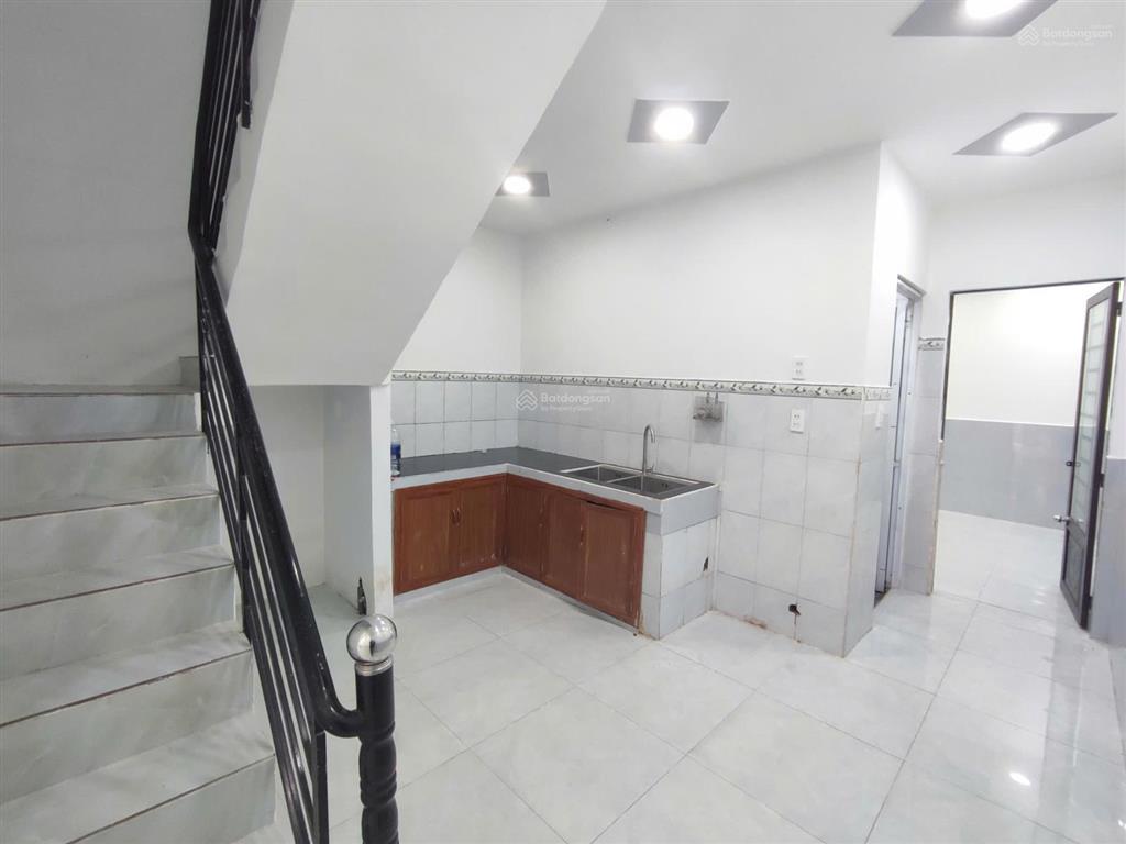 Nhà 2 tầng phước thiện  hẻm xe hơi  cạnh vinhomes grand park  52.5m2  sổ riêng  hoàn công