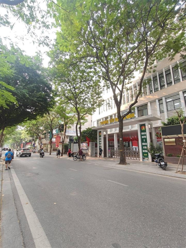 Chính chủ bán nhà mặt phố phùng chí kiên dt 105m2, mt 9.6m, 9 tầng, lô góc, hoàn công trên sổ