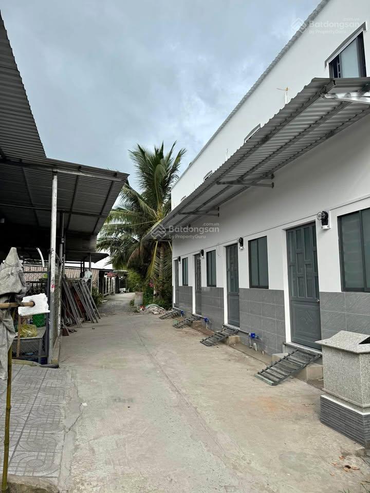 Bán gấp trọ đường giáp hải kcn tây bắc củ chi 12p280m2 sổ riêng giá 900tr thu nhập 15tr/ tháng