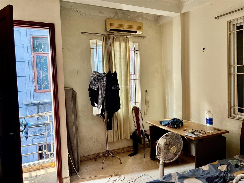 Bán nhà phố chùa láng đống đa  42 m2 t14 tầng  ô tô đỗ cửa  2 thoáng  dân xây  giá 12,5 tỷ tl