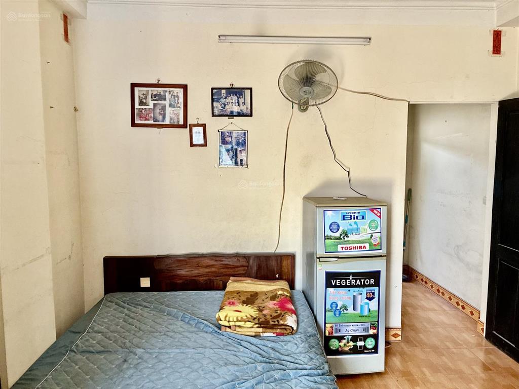 Bán nhà phố chùa láng đống đa  42 m2 t14 tầng  ô tô đỗ cửa  2 thoáng  dân xây  giá 12,5 tỷ tl