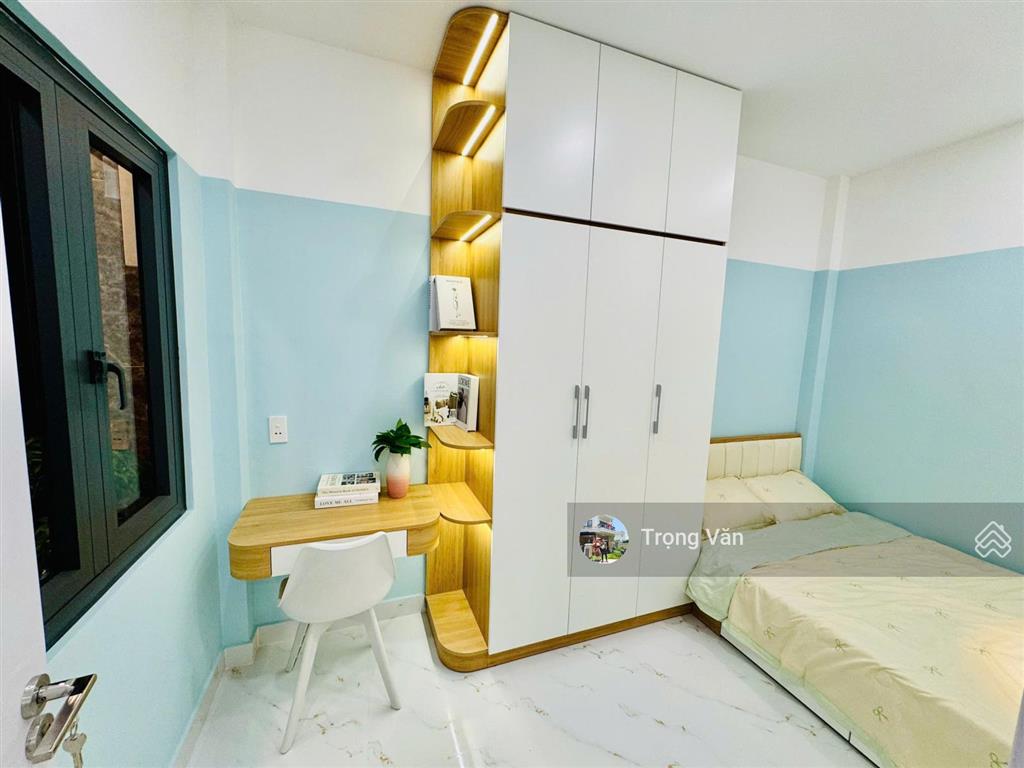 Nhà mới 2 mặt hẻm trước sau  sổ 54,5m²  hẻm xe hơi chạy thông. chỉ 9,8 tỷ