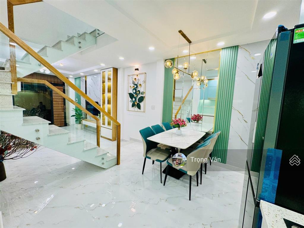 Nhà mới 2 mặt hẻm trước sau  sổ 54,5m²  hẻm xe hơi chạy thông. chỉ 9,8 tỷ