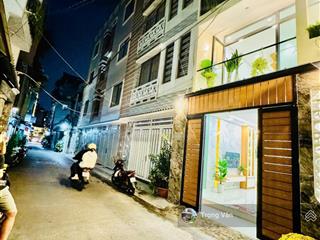 Nhà mới 2 mặt hẻm trước sau  sổ 54,5m²  hẻm xe hơi chạy thông. chỉ 9,8 tỷ