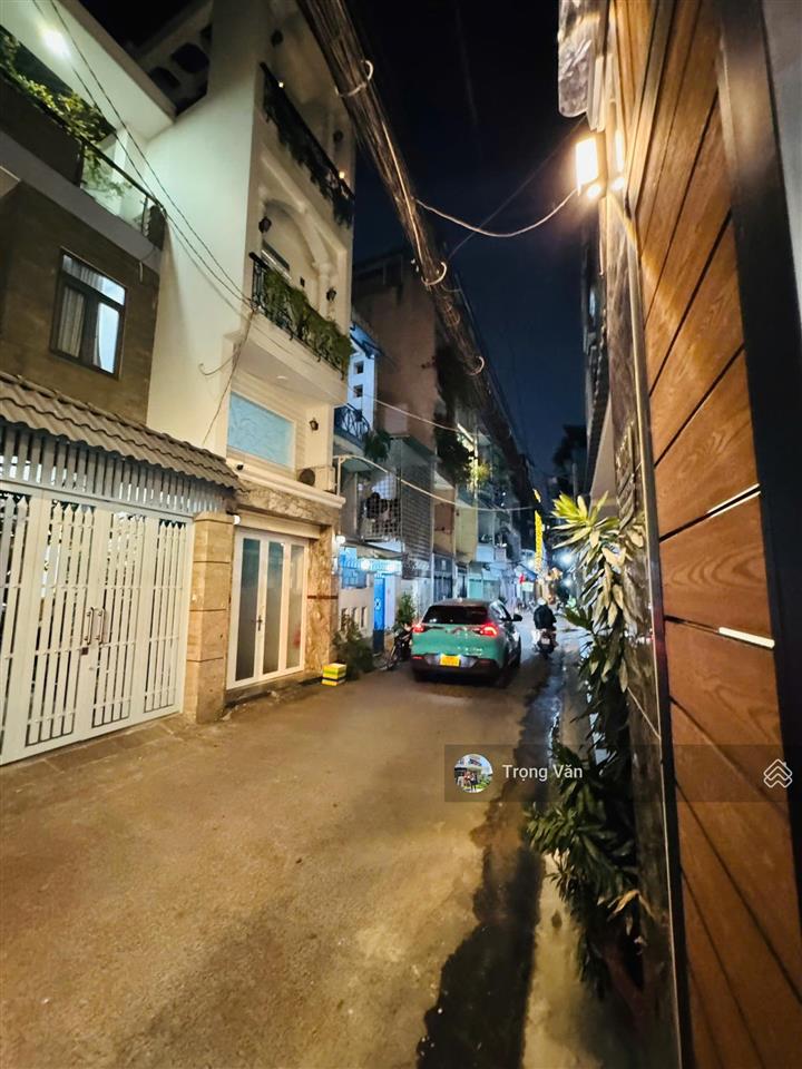 Nhà mới 2 mặt hẻm trước sau  sổ 54,5m²  hẻm xe hơi chạy thông. chỉ 9,8 tỷ