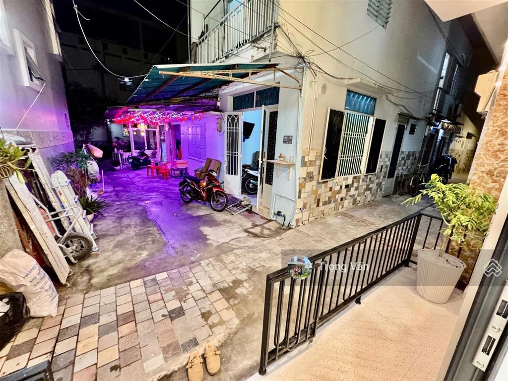 Nhà mới 2 mặt hẻm trước sau  sổ 54,5m²  hẻm xe hơi chạy thông. chỉ 9,8 tỷ