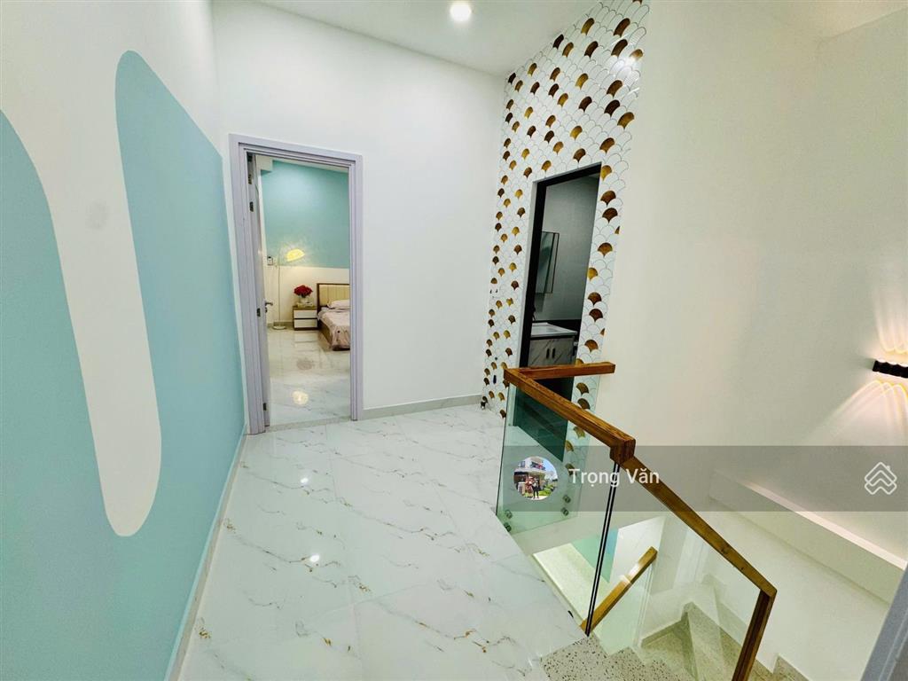 Nhà mới 2 mặt hẻm trước sau  sổ 54,5m²  hẻm xe hơi chạy thông. chỉ 9,8 tỷ