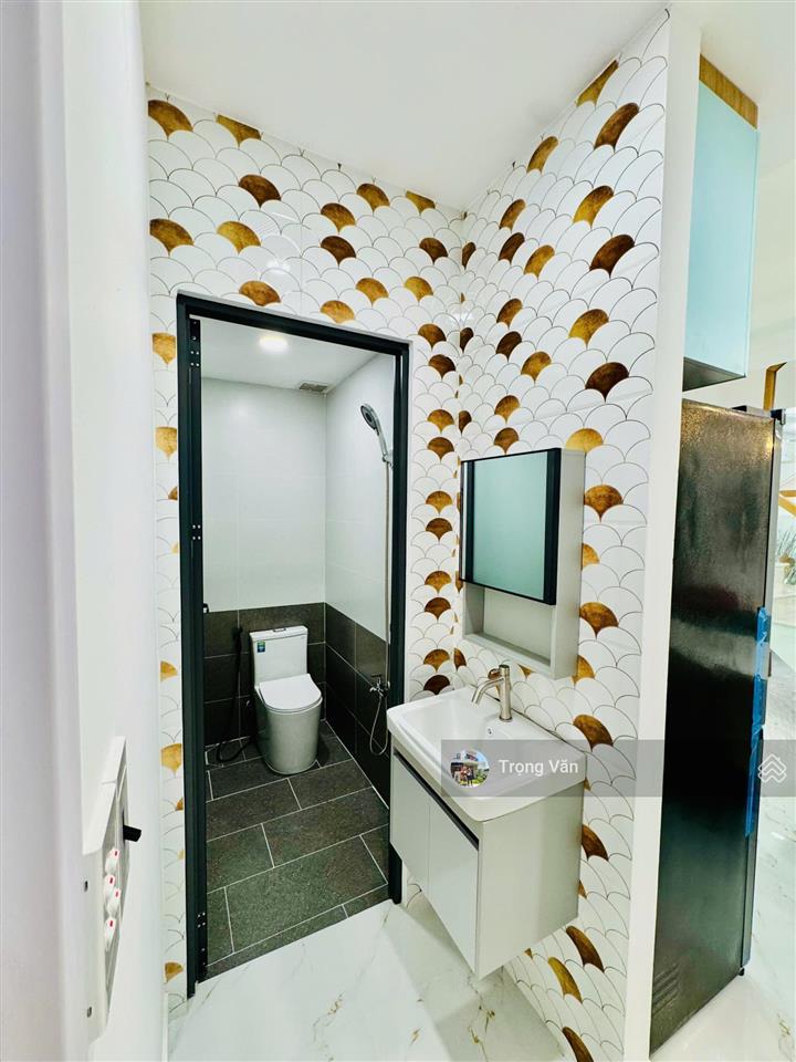 Nhà mới 2 mặt hẻm trước sau  sổ 54,5m²  hẻm xe hơi chạy thông. chỉ 9,8 tỷ