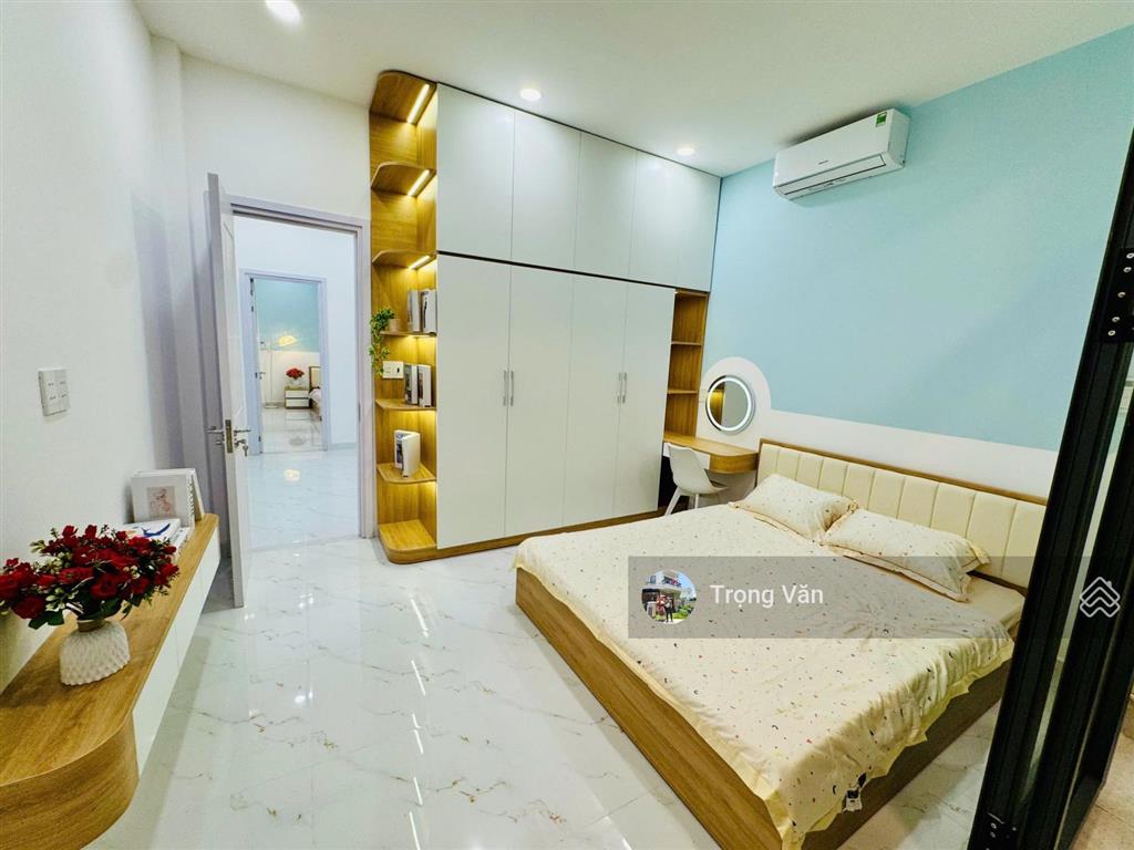 Nhà mới 2 mặt hẻm trước sau  sổ 54,5m²  hẻm xe hơi chạy thông. chỉ 9,8 tỷ