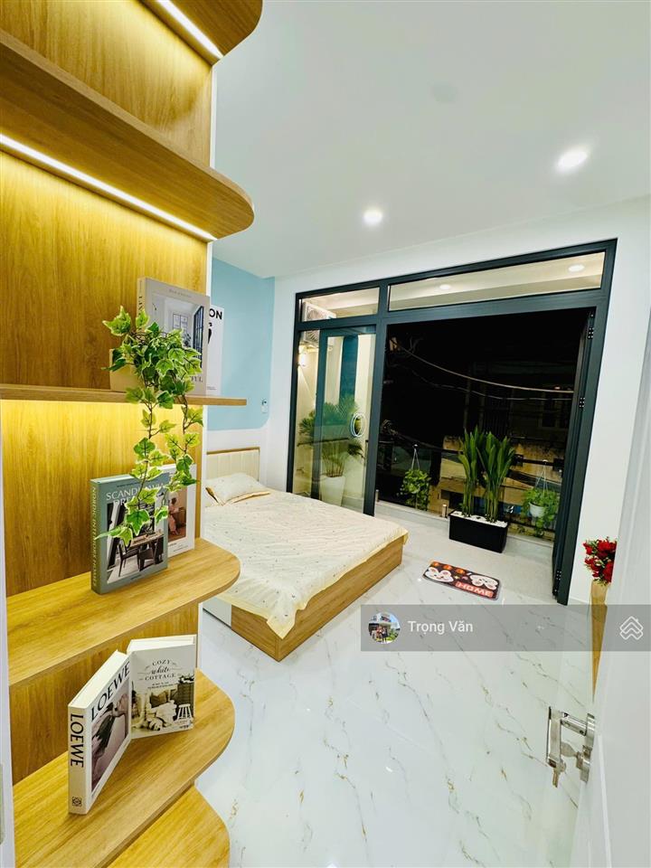 Nhà mới 2 mặt hẻm trước sau  sổ 54,5m²  hẻm xe hơi chạy thông. chỉ 9,8 tỷ