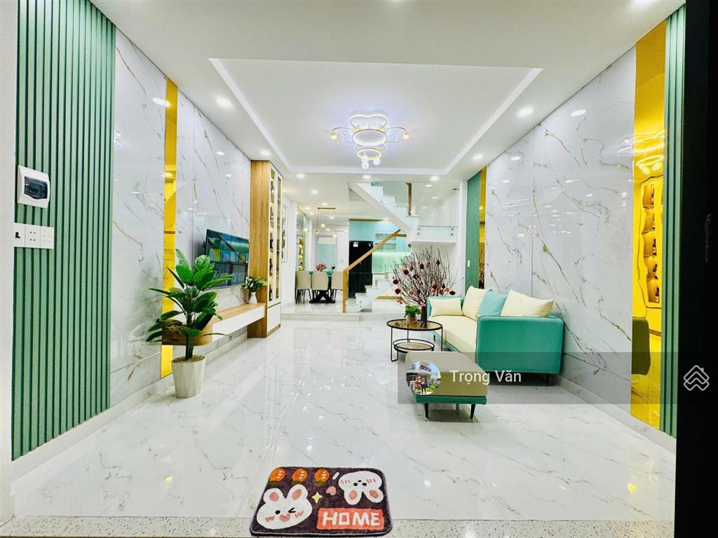 Nhà mới 2 mặt hẻm trước sau  sổ 54,5m²  hẻm xe hơi chạy thông. chỉ 9,8 tỷ