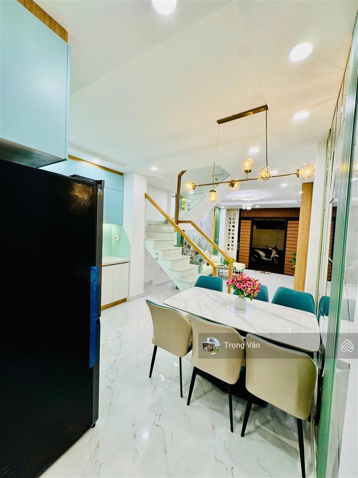 Nhà mới 2 mặt hẻm trước sau  sổ 54,5m²  hẻm xe hơi chạy thông. chỉ 9,8 tỷ