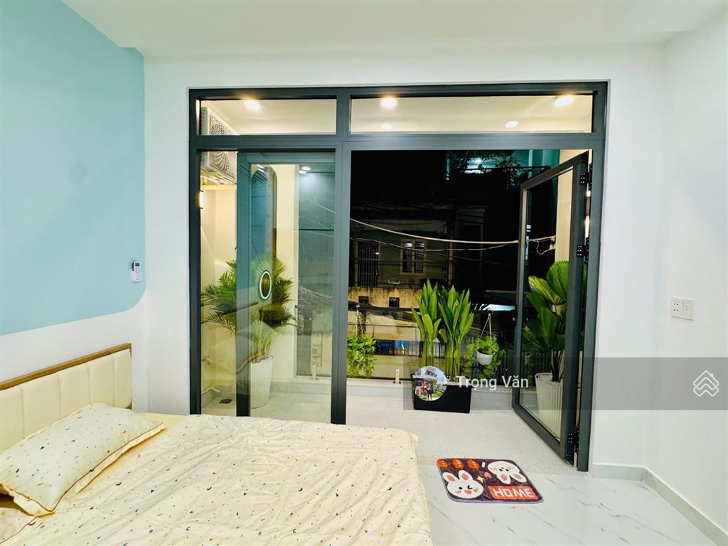 Nhà mới 2 mặt hẻm trước sau  sổ 54,5m²  hẻm xe hơi chạy thông. chỉ 9,8 tỷ