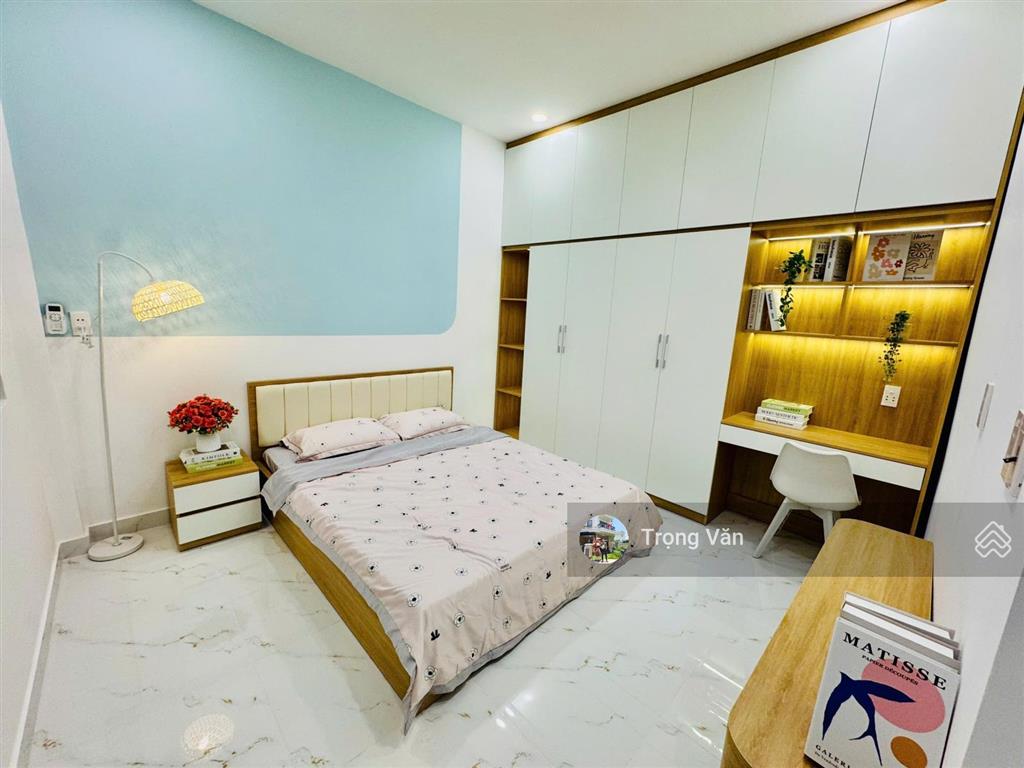 Nhà mới 2 mặt hẻm trước sau  sổ 54,5m²  hẻm xe hơi chạy thông. chỉ 9,8 tỷ