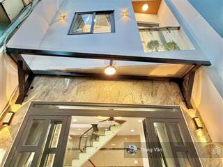 Nhà mới 4 tầng btct hc đủ  ngang hơn 4m  gần ra hxh huỳnh văn bánh. chỉ 4,99 tỷ