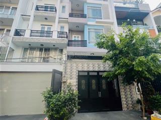 Bán gấp nhà 5x20m, 4tầng, giá 11.9tỷ, vị trí trung tâm, quận 7
