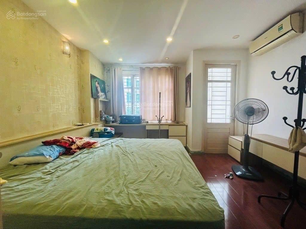 Bán nhà an trạch đống đa  dt 30m2  6 tầng  ô tô vào nhà  gần văn miếu  giá cắt lỗ