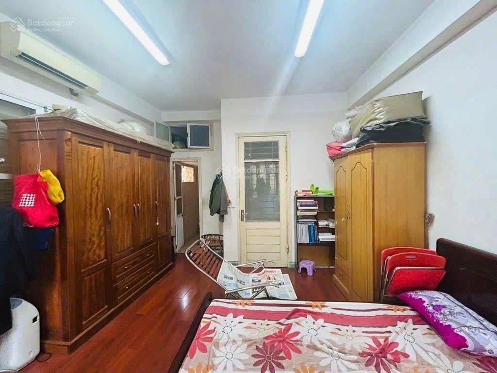 Bán nhà an trạch đống đa  dt 30m2  6 tầng  ô tô vào nhà  gần văn miếu  giá cắt lỗ