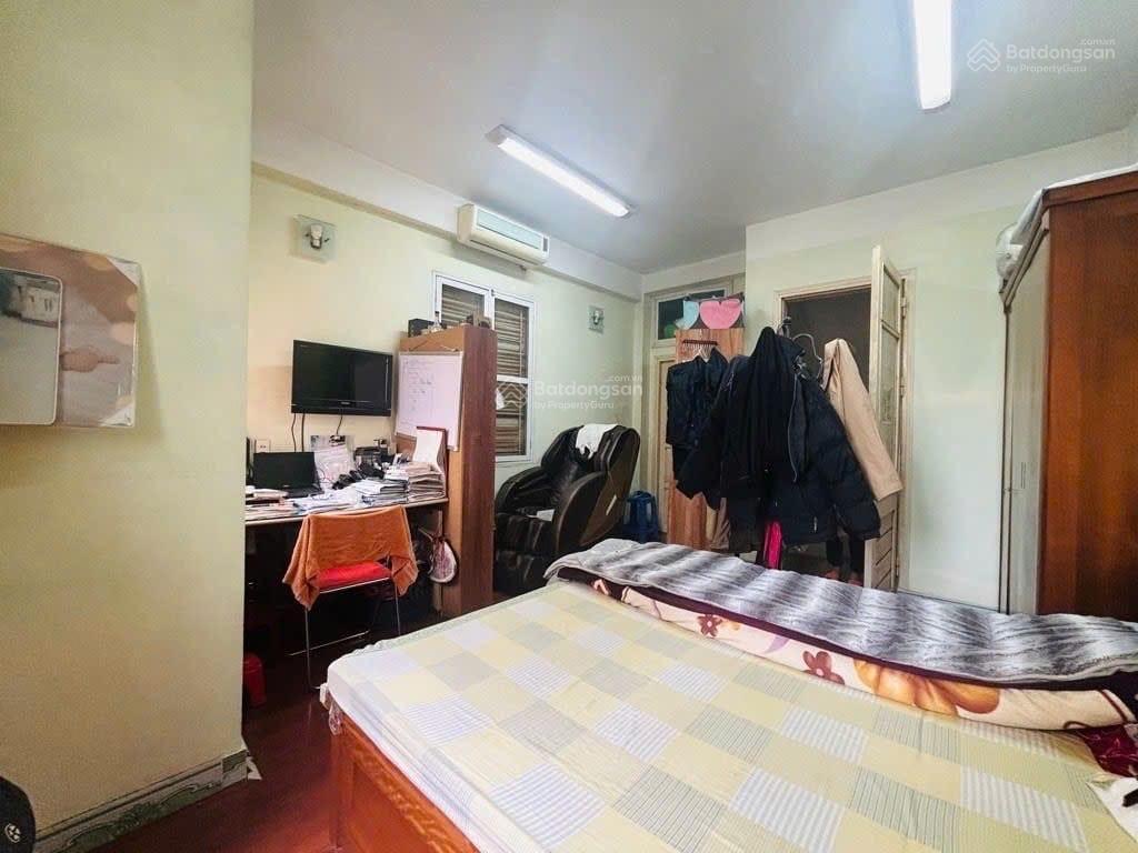 Bán nhà an trạch đống đa  dt 30m2  6 tầng  ô tô vào nhà  gần văn miếu  giá cắt lỗ