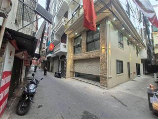 Chdv đống đa dòng tiền khủng 26 phòng cho thuê. vị trí đẹp ô tô đỗ cửa  lô góc mở 2 mặt thoáng.