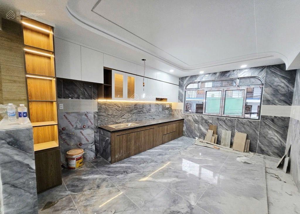 Bán nhà 5 tầng mới tinh đường an dương vương,gần bà hom chợ phú lâm.