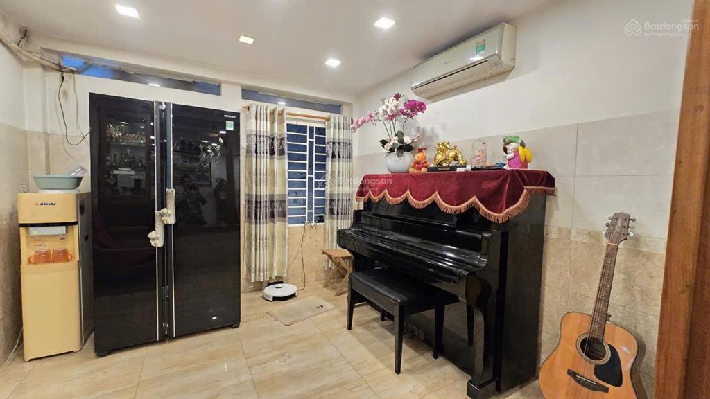 Định cư bán nhà  mặt tiền phan văn trị, bình thạnh  6,3x22m nở hậu 7m  2 tầng  giá bán 27 tỷ