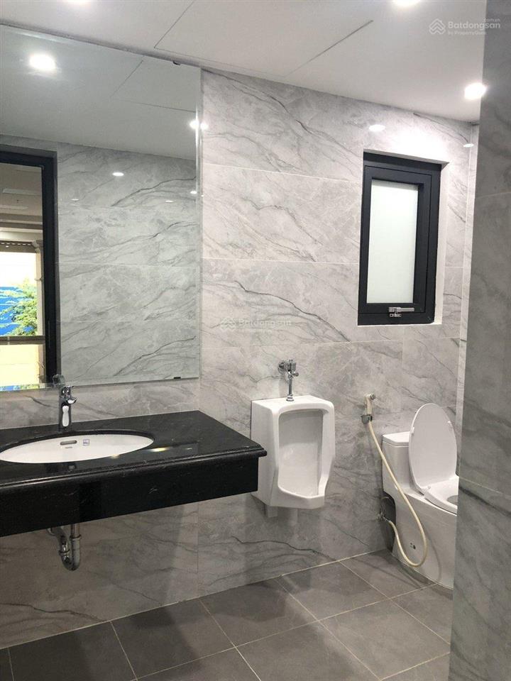 Cho thuê tòa nhà mặt phố đồng me. dt 128 m2 * 8 tầng + 1 hầm. mt 6 m, thông sàn, thang máy, pccc