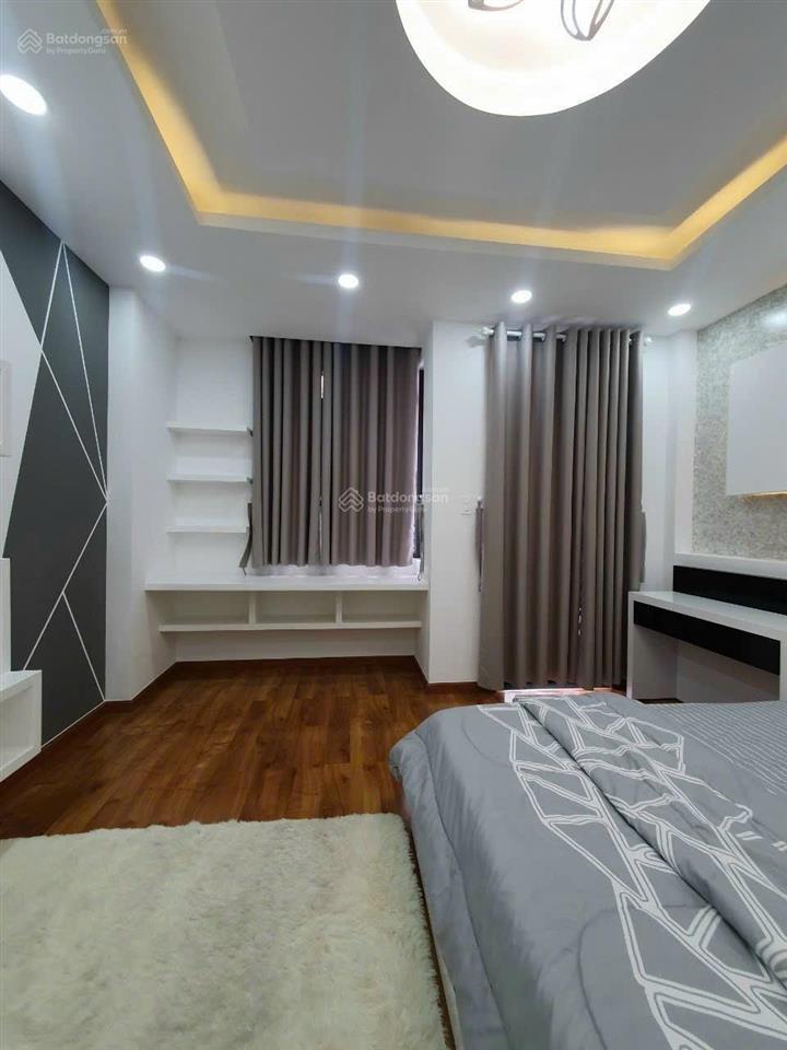 Nhà mt kd  đường nguyễn văn công gv  dt 80m2  5 tầng  9pn  dt 600tr/ năm shr giá 15,6 tỷ tl