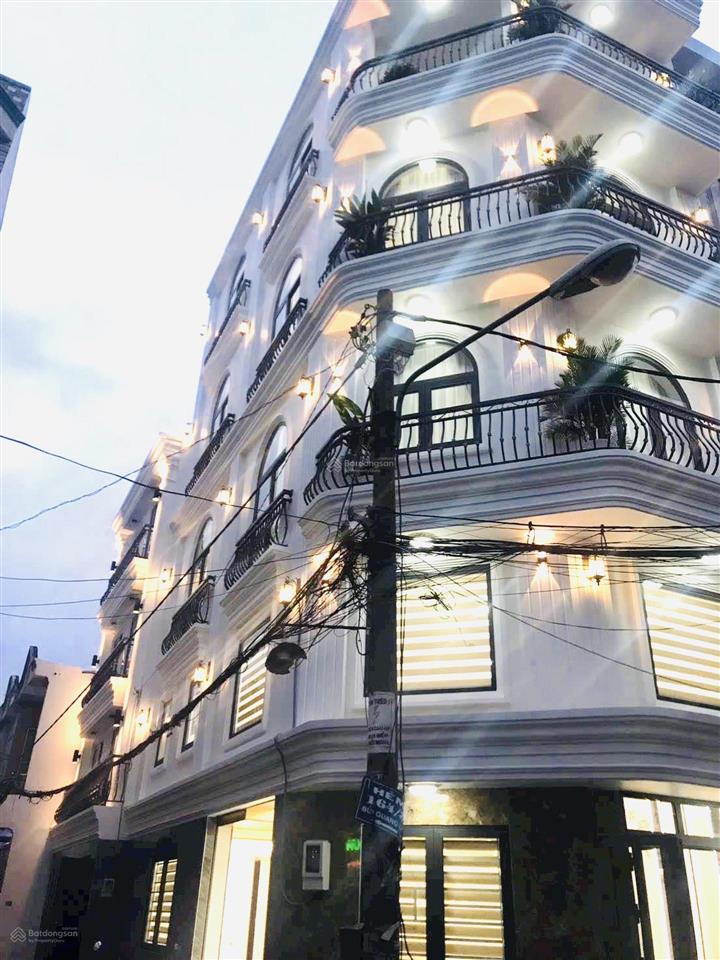 Nhà góc 2 mặt hẻm bùi quang là gv gần emart 2  5 tầng thang máy full nội thất