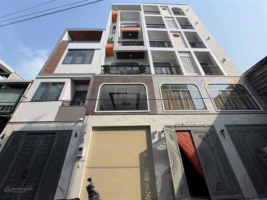 Bán nhà 5 tầng có thang máy full nội thất hẻm xe hơi tân hòa đông 4x14m giá 8.9 tỳ tl