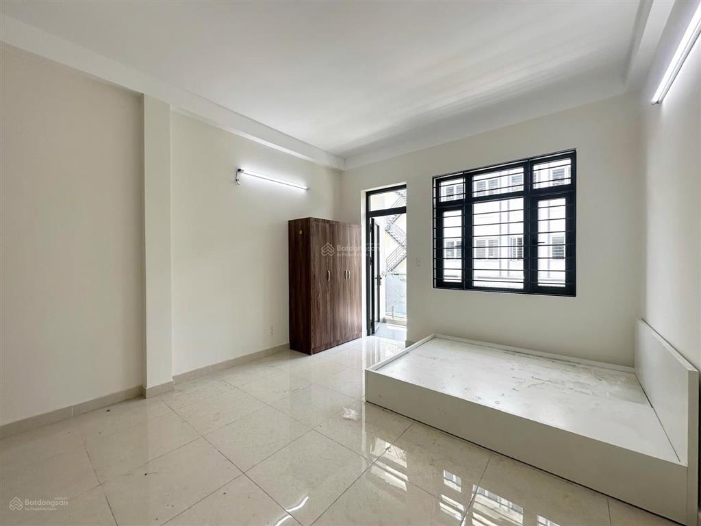 Cho thuê phòng ban công thang máy 42m2 bạch đằng bình thạnh gần hàng xanh, chợ bà chiểu, quận 1