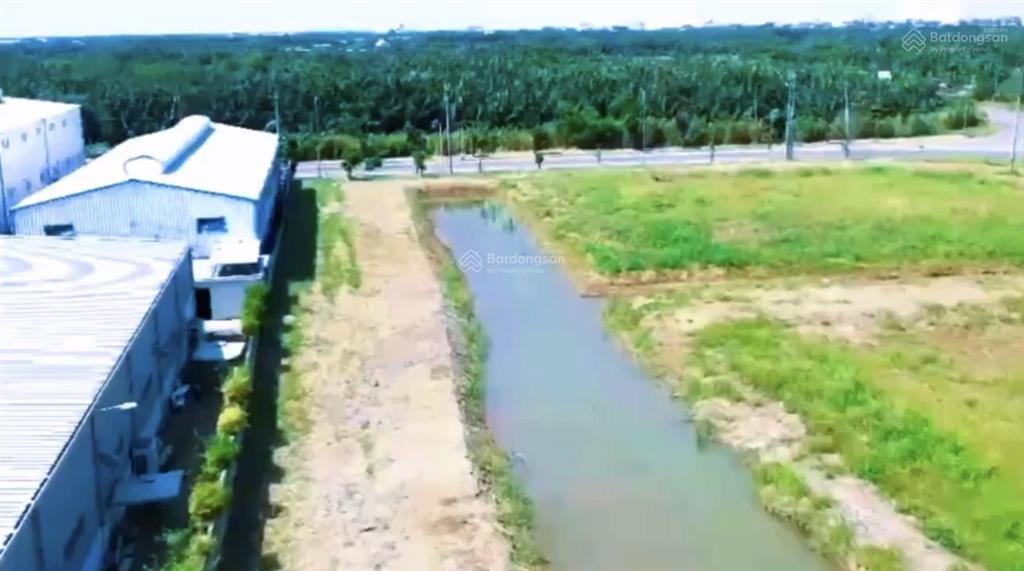 12000m2 đất mặt tiền đường nguyễn hữu thọ, xã hiệp phước, mặt sau giáp rạch, phù hợp làm kho, xưởng