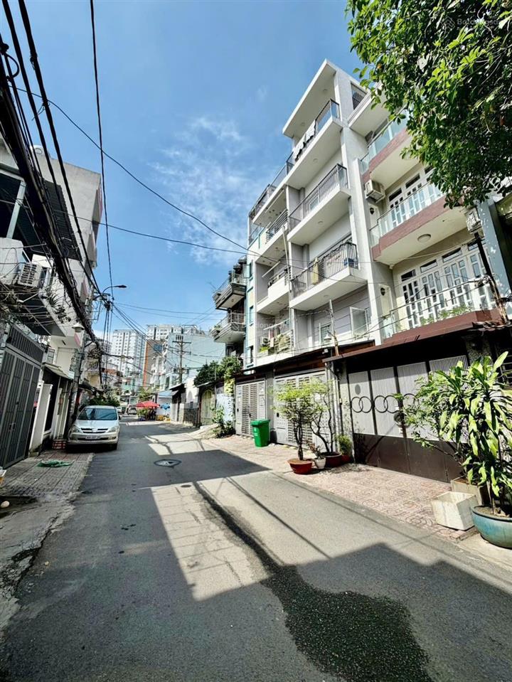 Bán nhà gần bến xe miền đông  4 x 15  trệt 3 lầu  được xây cao tầng  10 tỷ tl